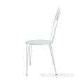 Silla Bistro plegable de hierro forjado con asiento estampado